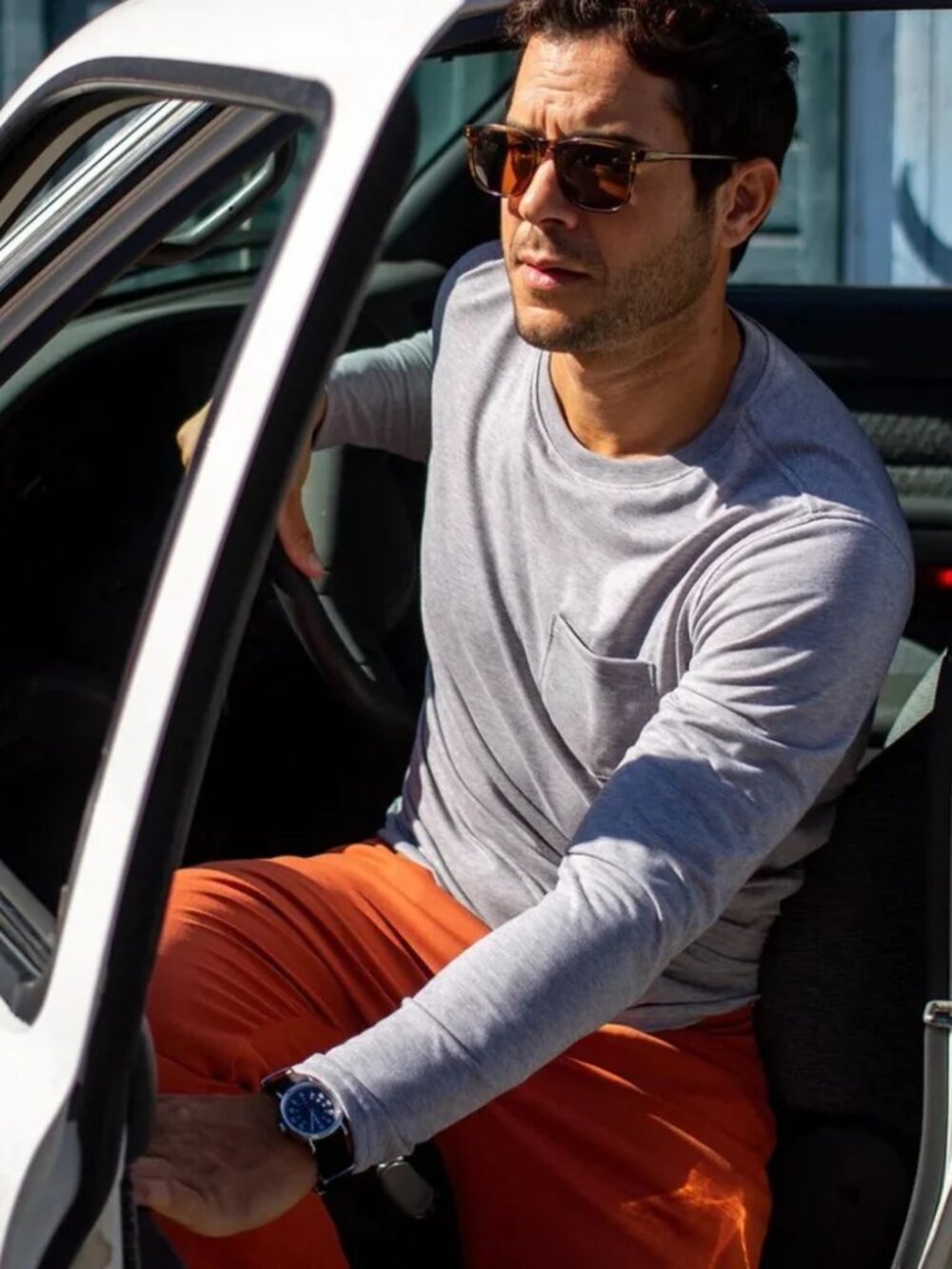 Myles Apparel Long Sleeve Curved Hem Pocket T-Shirt